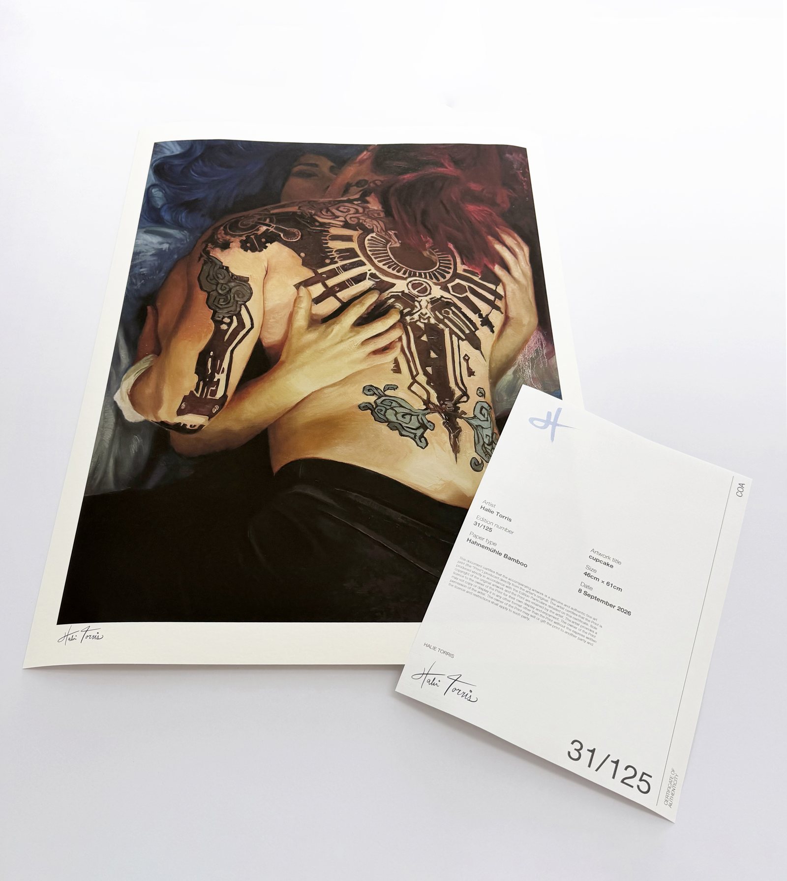 Halie Torris print edition 31 of 125 beside its certificate of authenticity